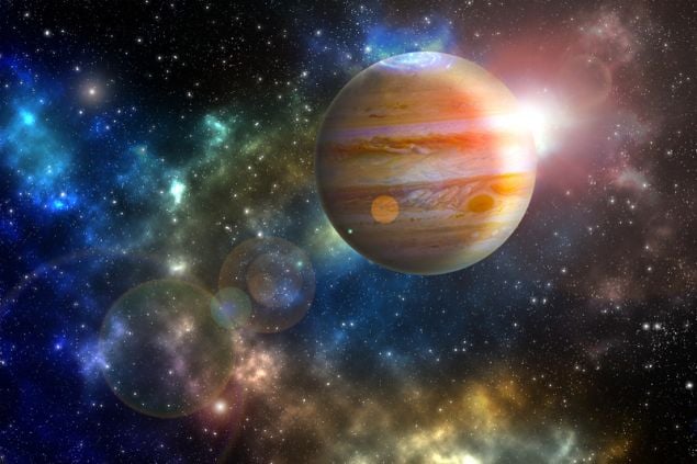 Planeta Júpiter em um céu estrelado e colorido.